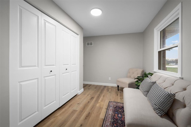 4 Tiger Dr, Wentzville, MO 63385 - sitting room with light wood-style floors and baseboards