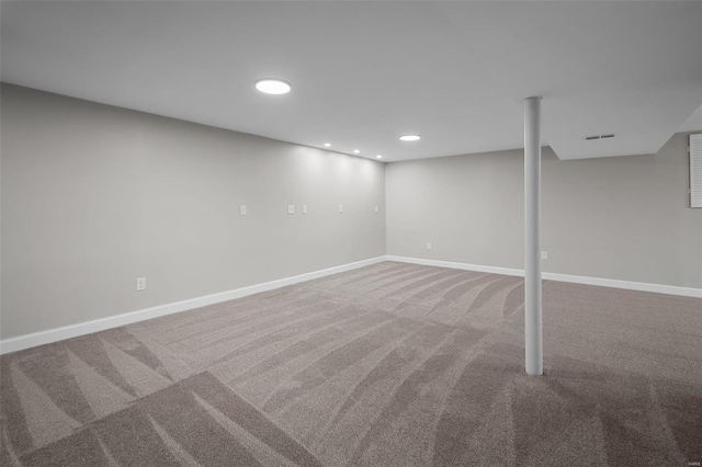 4 Tiger Dr, Wentzville, MO 63385 - finished below grade area with carpet, baseboards, and recessed lighting