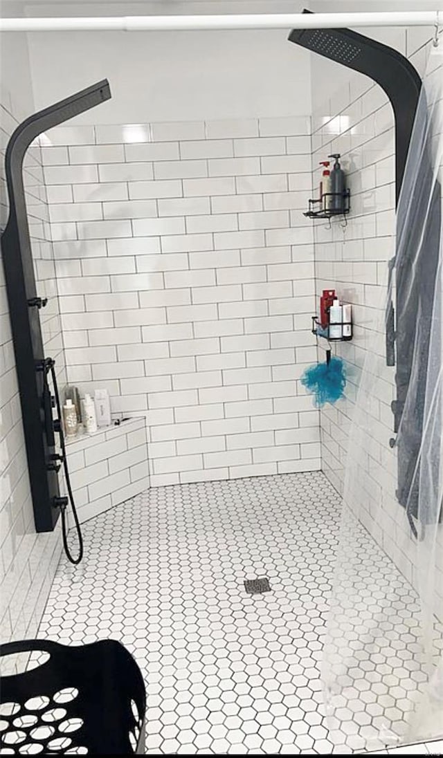 1564 Mandy Ln, Barnhart, MO 63012 - full bathroom with a stall shower and tile patterned flooring