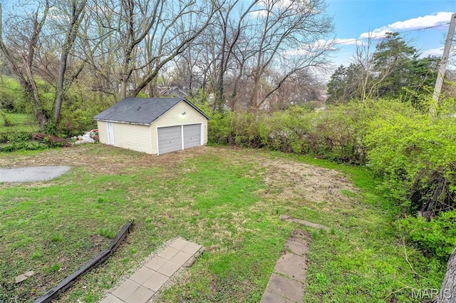 5537 Helen Ave, Saint Louis, MO 63136 - view of green lawn with an outbuilding and a garage