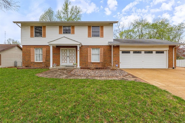 29 Park Charles Blvd N, Saint Peters, MO 63376 - view of front of home featuring french doors, a garage, concrete driveway, brick siding, and a front yard