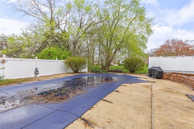 29 Park Charles Blvd N, Saint Peters, MO 63376 - view of swimming pool featuring a fenced backyard, a patio, and grilling area