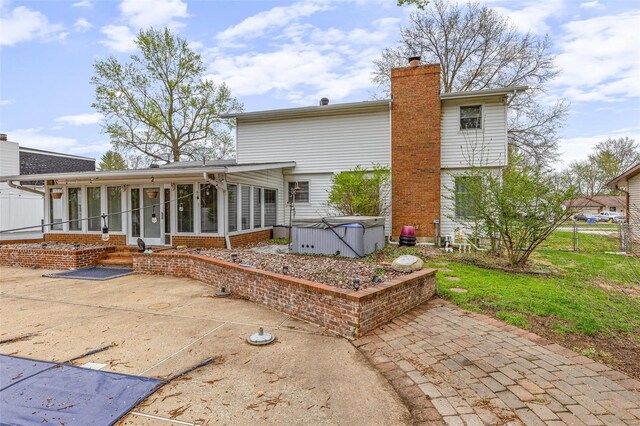29 Park Charles Blvd N, Saint Peters, MO 63376 - back of property featuring a hot tub, a patio, a sunroom, a chimney, and fence
