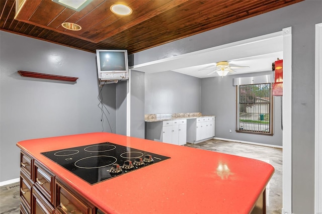 29 Park Charles Blvd N, Saint Peters, MO 63376 - kitchen featuring wood ceiling, black electric cooktop, baseboards, and a ceiling fan