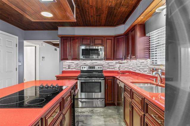 29 Park Charles Blvd N, Saint Peters, MO 63376 - kitchen with appliances with stainless steel finishes, wooden ceiling, a sink, tasteful backsplash, and reddish brown cabinets