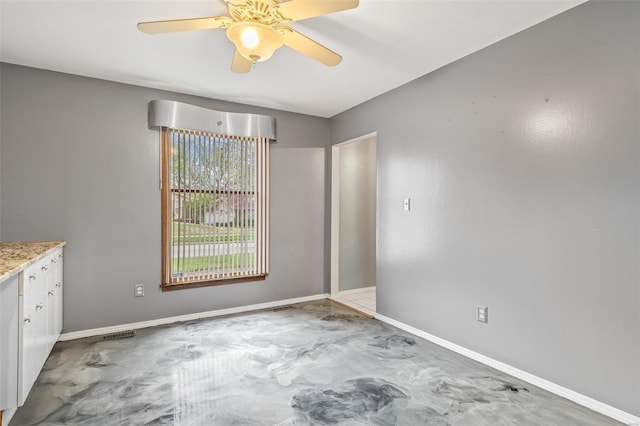 29 Park Charles Blvd N, Saint Peters, MO 63376 - unfurnished room with ceiling fan, baseboards, and concrete flooring