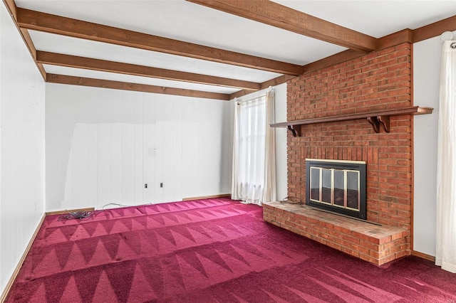 29 Park Charles Blvd N, Saint Peters, MO 63376 - unfurnished living room with carpet floors, beamed ceiling, and a brick fireplace