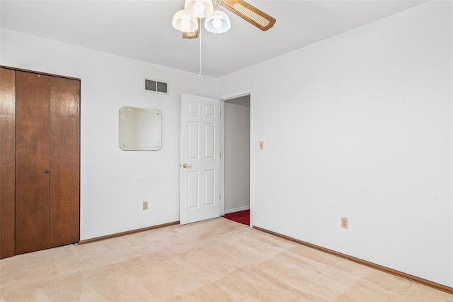 29 Park Charles Blvd N, Saint Peters, MO 63376 - unfurnished bedroom with baseboards, carpet, a closet, and a ceiling fan