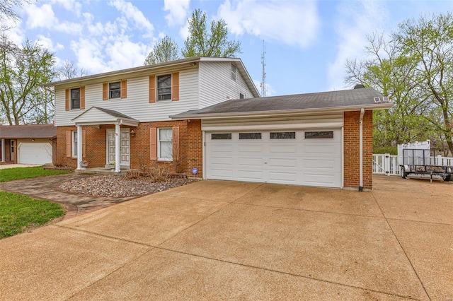 29 Park Charles Blvd N, Saint Peters, MO 63376 - view of front of home with brick siding, concrete driveway, and an attached garage