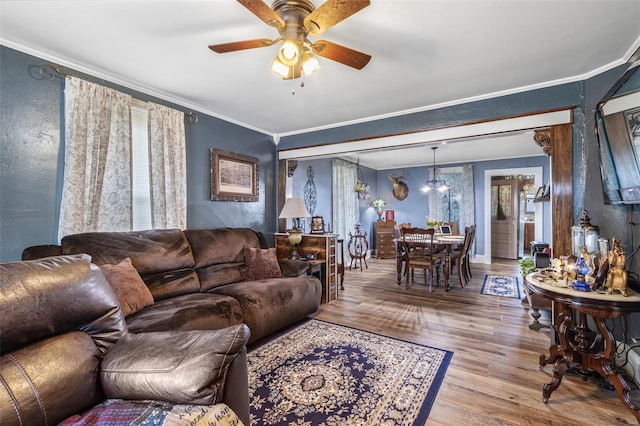 8 Donald St, Park Hills, MO 63601 - living room with wood finished floors, ceiling fan, ornamental molding, and a chandelier