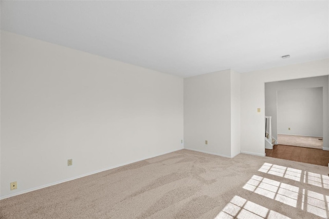 7 Beavertail Ct, Florissant, MO 63033 - spare room with carpet floors and baseboards