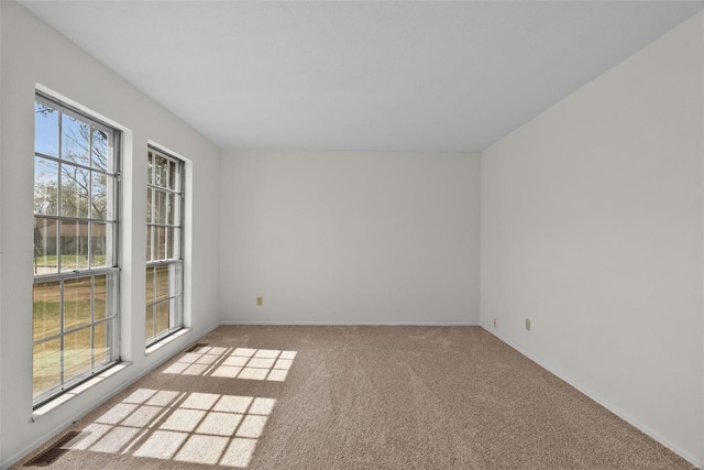 7 Beavertail Ct, Florissant, MO 63033 - carpeted spare room featuring baseboards