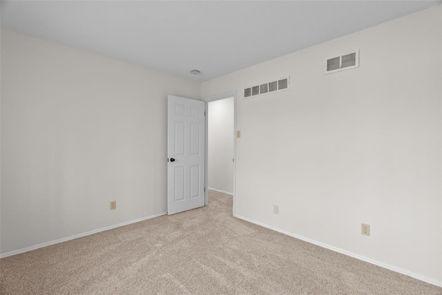7 Beavertail Ct, Florissant, MO 63033 - unfurnished room with light colored carpet and baseboards