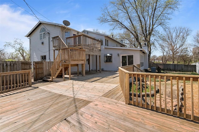 7 Beavertail Ct, Florissant, MO 63033 - wooden deck featuring a fenced backyard and stairway