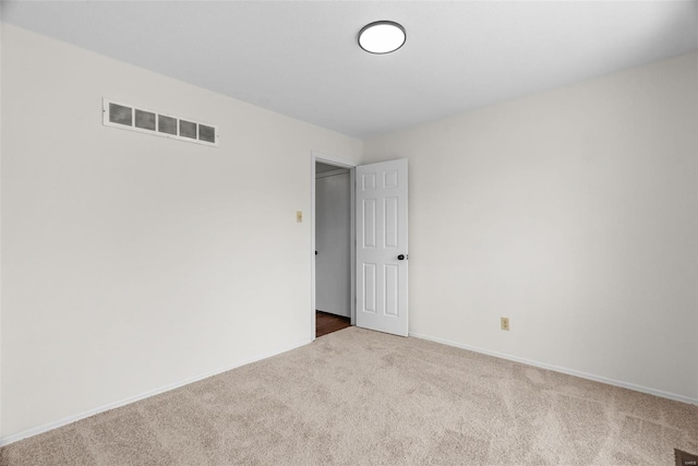 7 Beavertail Ct, Florissant, MO 63033 - spare room with carpet floors and baseboards