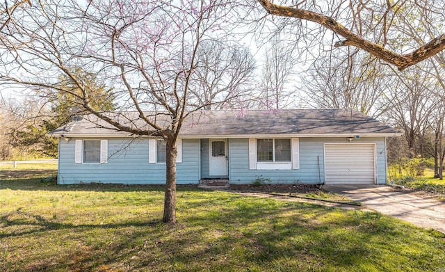 10757 Kilpatrick Cir, Rolla, MO 65401 - ranch-style home with an attached garage, driveway, and a front lawn