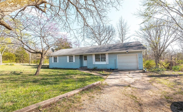 10757 Kilpatrick Cir, Rolla, MO 65401 - single story home with driveway, a garage, and a front yard