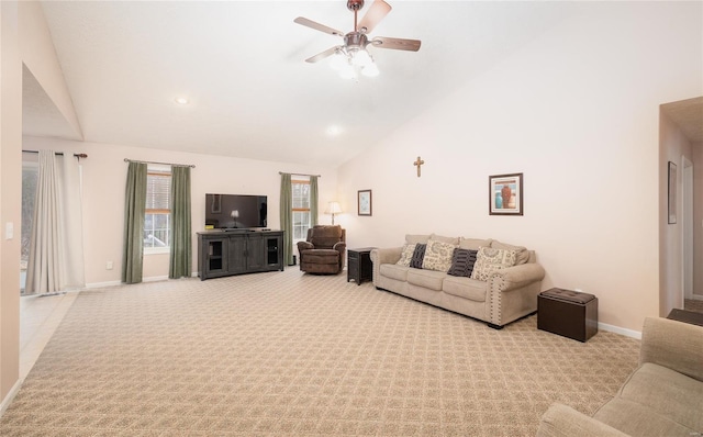 1205 Britt Ln, Rolla, MO 65401 - living area with light colored carpet, a ceiling fan, baseboards, and high vaulted ceiling