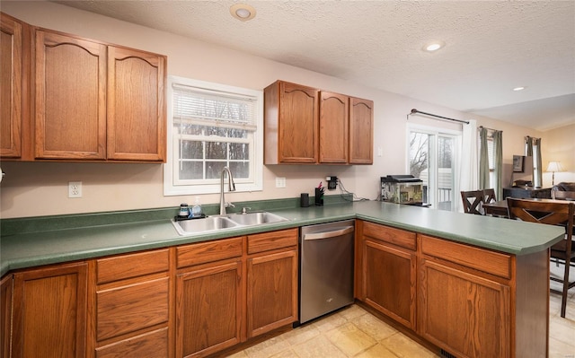 1205 Britt Ln, Rolla, MO 65401 - kitchen featuring dishwasher, a sink, a peninsula, plenty of natural light, and recessed lighting
