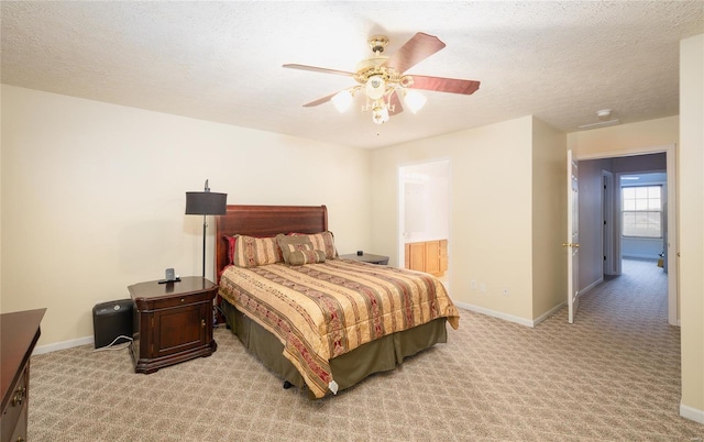 1205 Britt Ln, Rolla, MO 65401 - bedroom featuring light colored carpet, baseboards, ceiling fan, connected bathroom, and a textured ceiling
