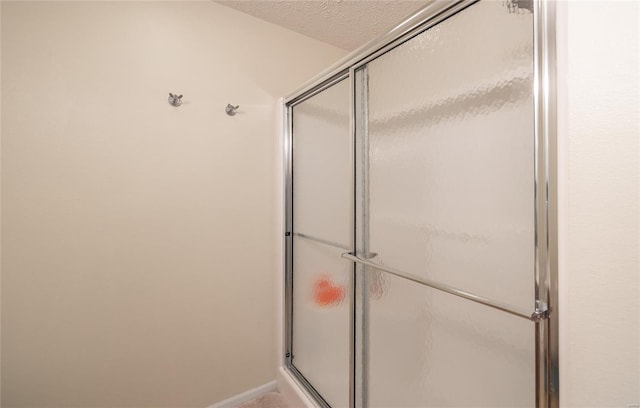 1205 Britt Ln, Rolla, MO 65401 - full bathroom with a stall shower and baseboards