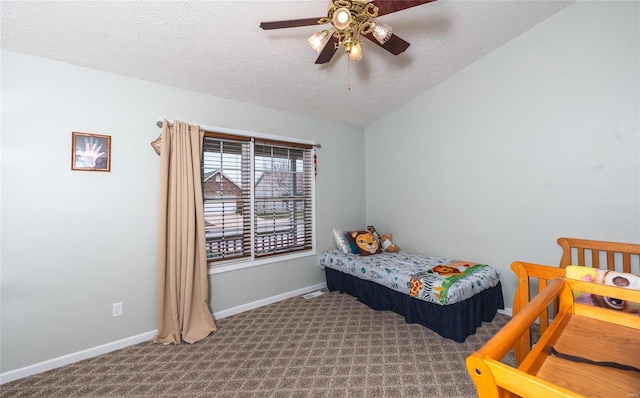 1205 Britt Ln, Rolla, MO 65401 - carpeted bedroom featuring baseboards, a textured ceiling, and a ceiling fan