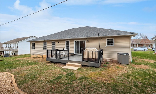 1205 Britt Ln, Rolla, MO 65401 - rear view of property with a wooden deck, a lawn, central AC, a shingled roof, and crawl space
