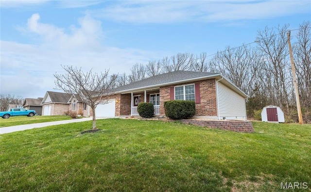 1205 Britt Ln, Rolla, MO 65401 - single story home with an attached garage, brick siding, concrete driveway, and a front yard