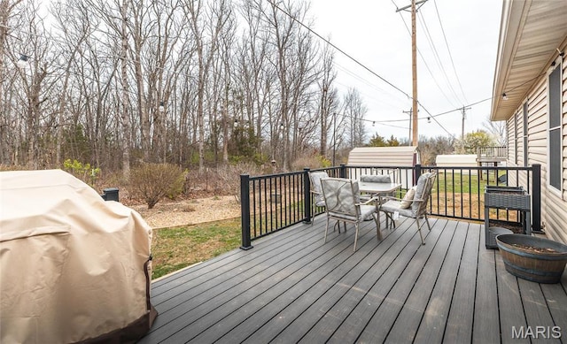 1205 Britt Ln, Rolla, MO 65401 - deck featuring outdoor dining area and area for grilling