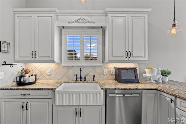 kitchen with dishwasher, a sink, decorative backsplash, and white cabinetry