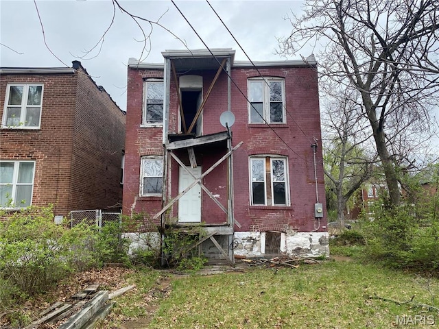 6010 Bartmer Ave, Saint Louis, MO 63112 - rear view of house featuring brick siding