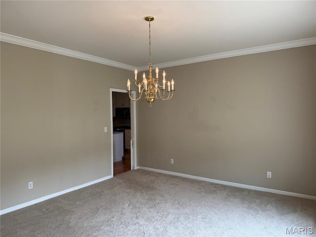 123 El Rancho Dr, Hannibal, MO 63401 - unfurnished room with a chandelier, carpet, crown molding, and baseboards