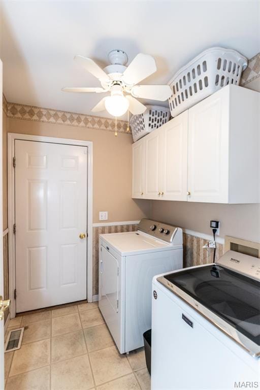 9 Shelby Crest Ct, Ofallon, MO 63366 - clothes washing area with independent washer and dryer, cabinet space, a ceiling fan, and light tile patterned flooring