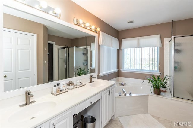 9 Shelby Crest Ct, Ofallon, MO 63366 - full bathroom with a stall shower, a bath, and double vanity