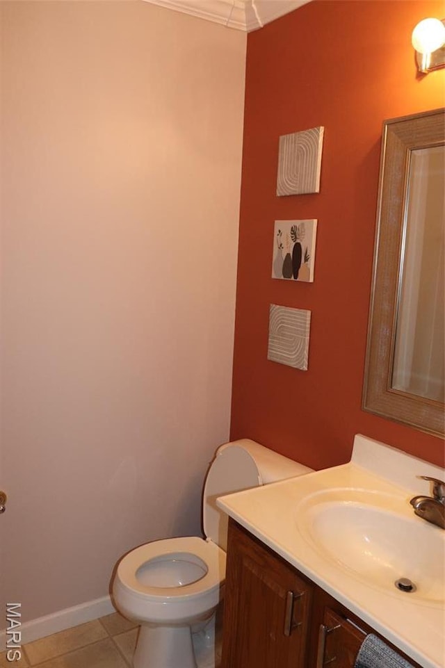 9 Shelby Crest Ct, Ofallon, MO 63366 - bathroom featuring vanity, tile patterned flooring, ornamental molding, toilet, and baseboards