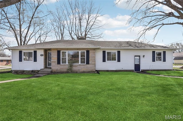 single story home featuring a front lawn and a chimney