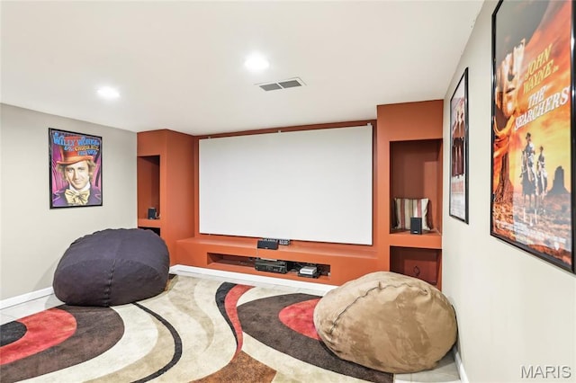 home theater room featuring recessed lighting and baseboards