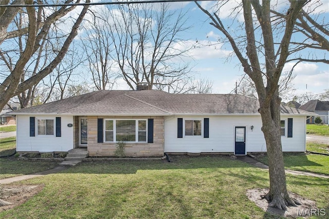 single story home with a front yard, a chimney, and a shingled roof