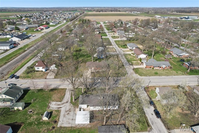 aerial view of property's location featuring nearby suburban area