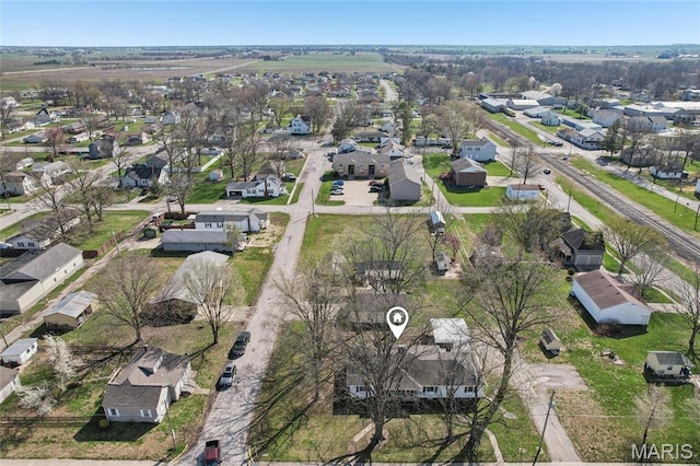 aerial view of property's location with nearby suburban area
