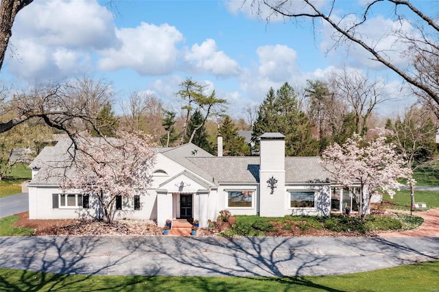 view of front of property with a chimney