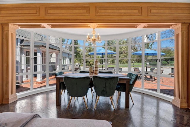 dining room featuring a chandelier