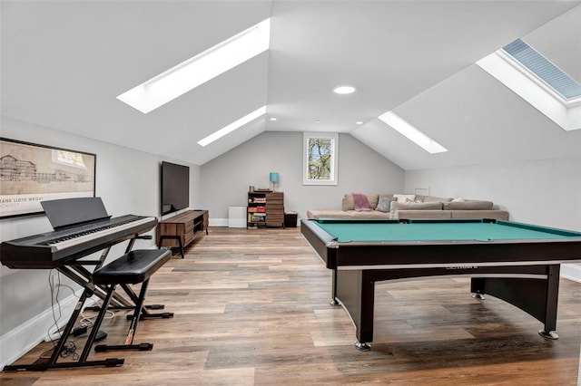 playroom with a skylight, vaulted ceiling, wood finished floors, pool table, and baseboards