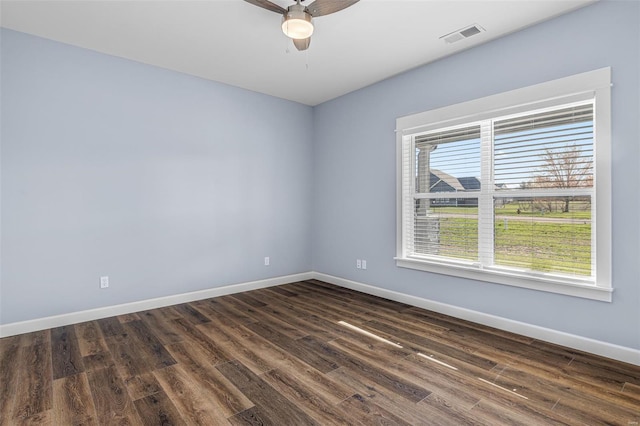 213 Lakeview Dr, Farmington, MO 63640 - spare room with baseboards, ceiling fan, and dark wood finished floors