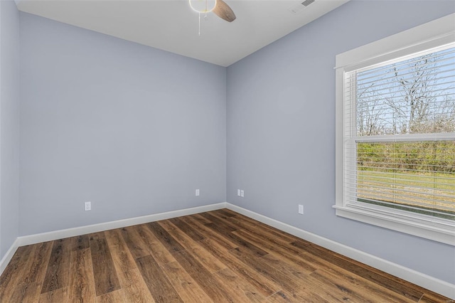 213 Lakeview Dr, Farmington, MO 63640 - unfurnished room featuring baseboards, dark wood-style floors, and ceiling fan