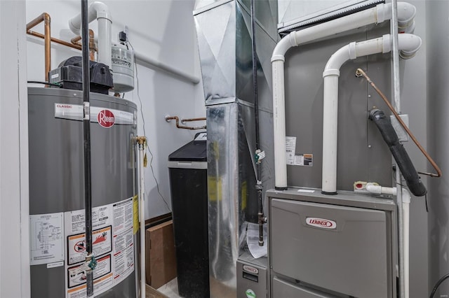 213 Lakeview Dr, Farmington, MO 63640 - utility room with gas water heater and heating unit
