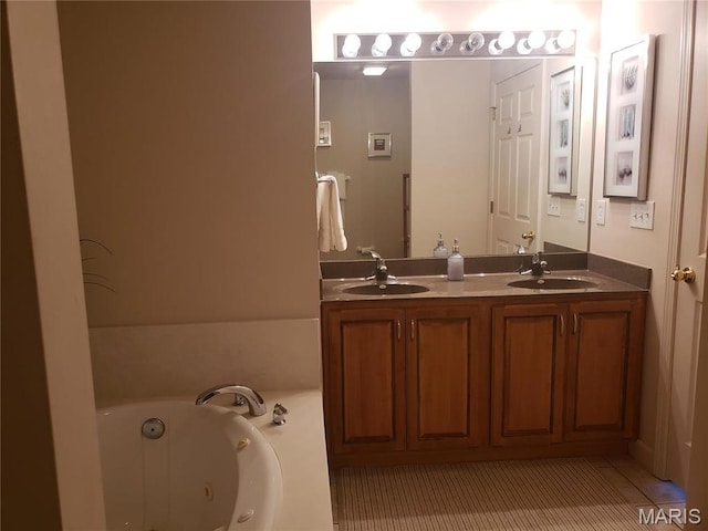 bathroom featuring a whirlpool tub, double vanity, and tile patterned flooring