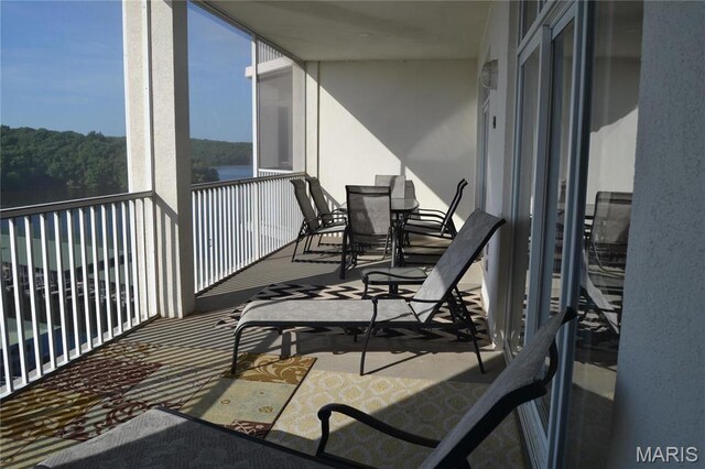 balcony featuring outdoor dining space