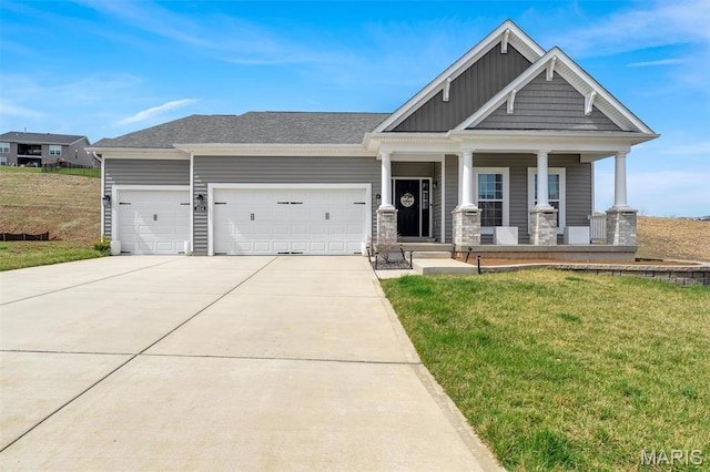 1154 Bloomfield Dr, Eureka, MO 63025 - craftsman-style house with an attached garage, concrete driveway, a front lawn, a porch, and board and batten siding