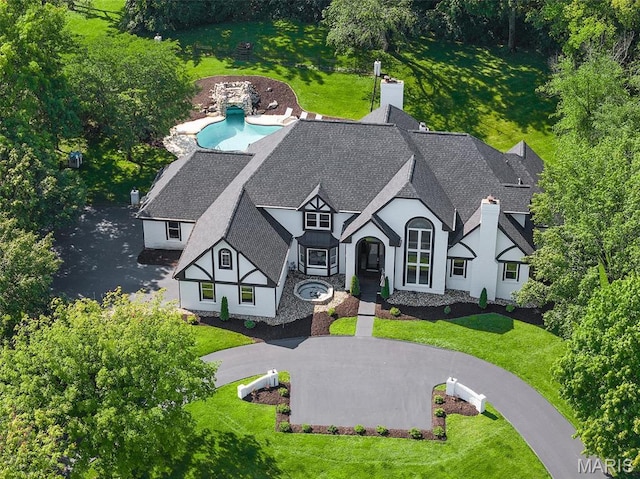 13516 Weston Park Dr, Saint Louis, MO 63131 - view from above of property with a pool